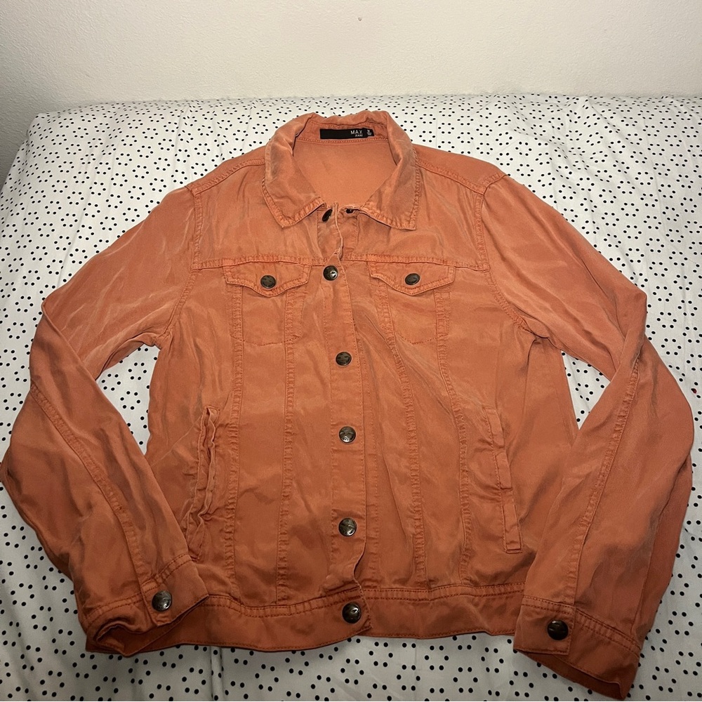 Light orange/ peach long sleeve button up t shirt.